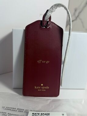 NWT Kate Spade “off we go” Merlot Leather Luggage Tag sealed original packaging